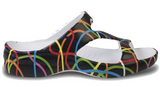A colorful, abstract-patterned sandal with a vibrant design of lines and shapes in various colors.