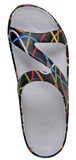 A colorful, patterned sandal with a white sole and a black strap.